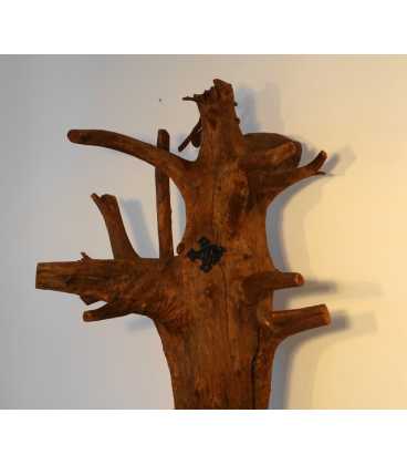 Coat stand formed of a tree trunk with metal hooks 060